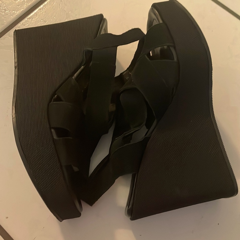 Donald Pliner black leather sandals.